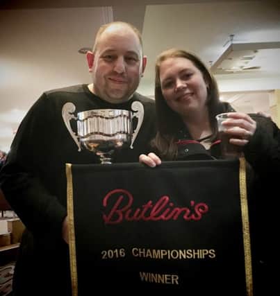 Hebden Bridge Brass Band's musical director Alan Hobbins,  and his wife Laura, who also plays cornet with the band, celebrate the first section win at the national Butlin's competition at Skegness