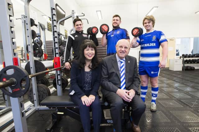 New gym equipment at Calderdale College Inspire Centre. Back, from the left, Halifax RLFC captain Scott Murrell, Halifax RLFC player Luke Ambler and Rugby Centre of Excellence captain Billy Clewley. Front, Calderdale College vice principal Denise Cheng-Carter and Halifax RLFC chairman Michael Steele.