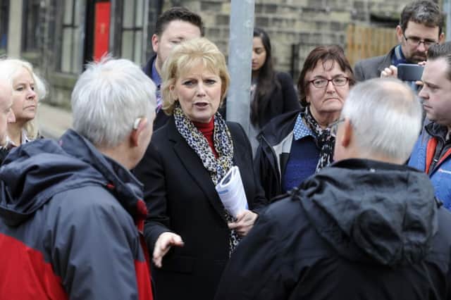 Business Minster Anna Soubry visits flood hit Mytholmroyd to speak to local businesses.  25 January 2016.  Picture Bruce Rollinson