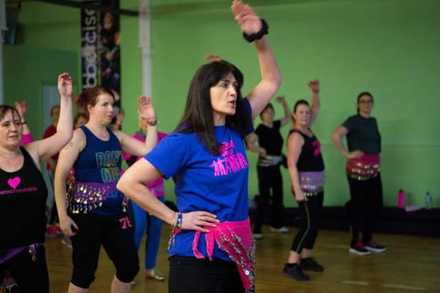 Shahnaz Mir leads the Zumba class at the Floodlight Workout in aid of the Flood Relief Fund Ã¢Â¬ Asquith Bottom Mills, Sowerby Bridge