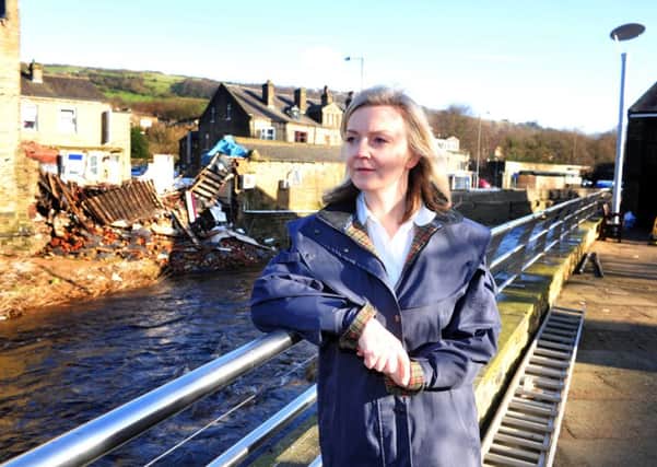 Environment Secretary Elizabeth Truss during a fleeting visit to Mytholmroyd.