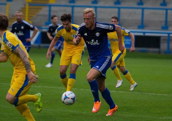 Jordan Burrow in action for FC Halifax Town v Chester in their league meeting at the Shay earlier this season