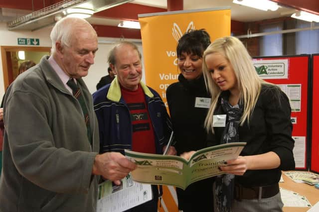 Voluntary Action Calderdale funding fair held at the Elsie Whiteley Inovation Centre, Halifax. Brian Crossley and Rod Stott from  Whitwell Green Play and Grow with Maggie Opacic and Olivia Swingler from Voluntary Action Calderdale.
