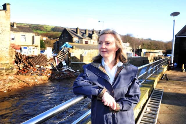 28 January 2016.......      Elizabeth Truss MP, Secretary of State for Environment, Food and Rural Affairs makes quick visit to see Mytholmroyd following the floods over Christmas. . Picture Tony Johnson
