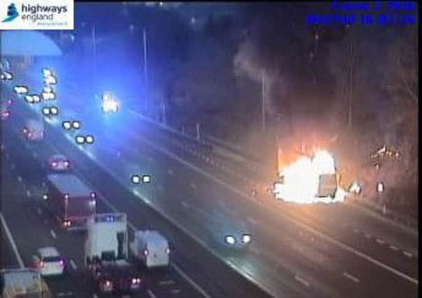 The lorry blaze on the M62 between junction 26 and junction 27 captured by Highways England