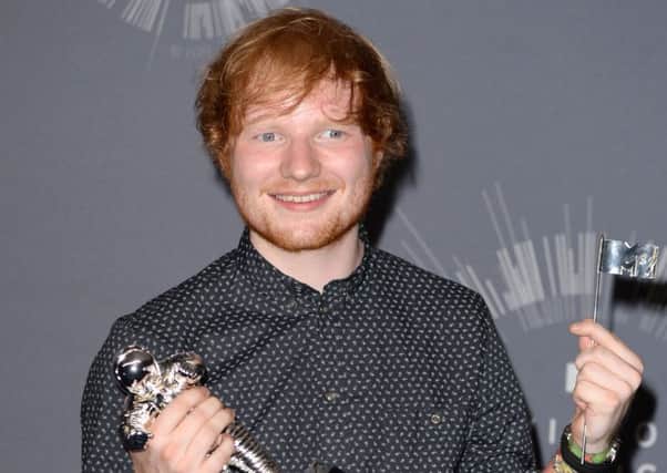 Ed Sheeran backstage in the MTV Video Music Awards 2014. PA/PA Wire