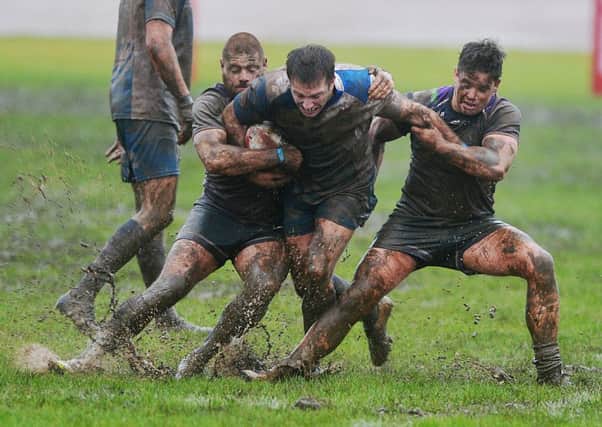 Ben Heaton and Scott Murrell get to work in defence. Picture courtesy of Cumbrian Newspapers