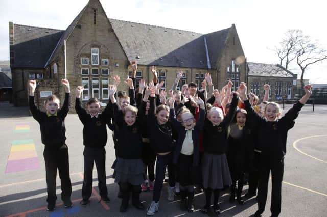 Moorside Community Primary School, Ovenden celebrate funding for a new school building.