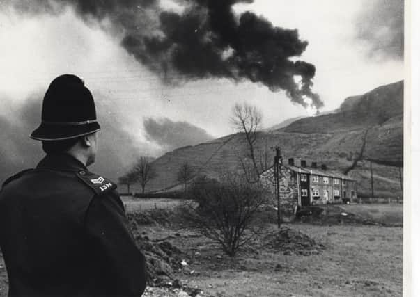 Police Sgt Paul Guest looks onto the 1984 fire, a crucial point in Summits history. It burned for three days