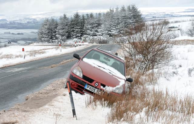 The snow was causing difficult driving conditions across much of the county this morning