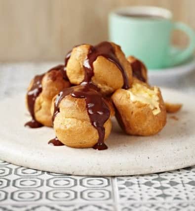 ASK Italian has worked with food psychologist Dr Christy Fergusson to identify the science behind temptation and precisely what makes certain foods impossible to resist. Pictured are ASK Italian profiteroles. See Ross Parry copy RPYPUD : The science behind food temptation has been revealed by boffins who used a temptation ratio to create Britain's most tempting DESSERT.   The Chocolate Lava Mountain provides an irresistible temptation combination and has been unveiled just in time for National Dessert Day tomorrow (Wed). Diners are invited to pour molten toffee onto a chocolate cup, causing it to melt and reveal cool vanilla gelato sitting on rich chocolate fondant. The smells of warm chocolate and toffee, the sight of the chocolate cup softening and the temperature and texture contrast with the cool creamy ice cream all add to the tempting pud. ASK Italian has worked with food psychologist Dr Christy Fergusson to identify the science behind temptation and precisely what makes certain foods impossible to resi