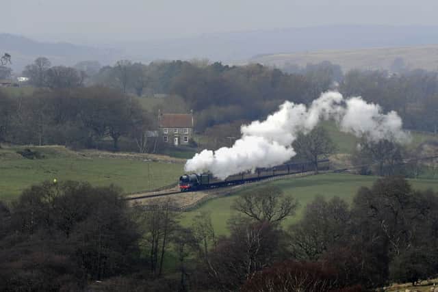 The Flying Scotsman steams across the North Yorks Moors during its first weekend  on the North Yorks Moors Railway.