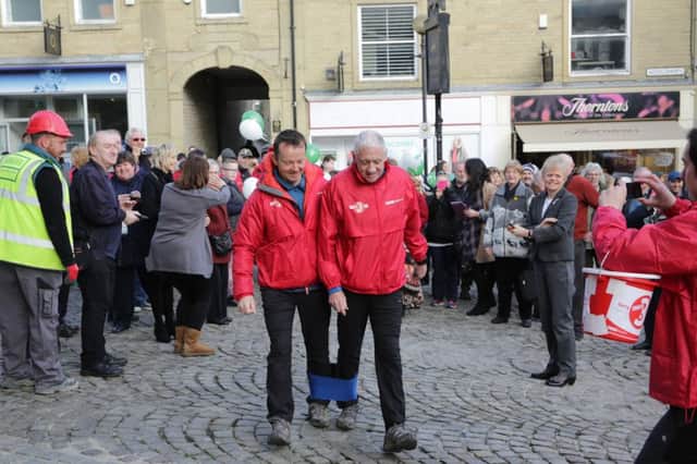 Look NorthÃ¢Â¬"s Harry Gration and Paul Hudson in Halifax for their three-legged challenge for Sport Relief.