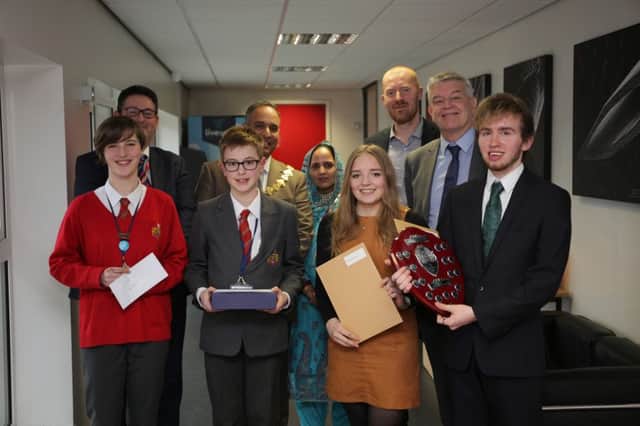 North Halifax Grammar School prize winning pupils Maisie McManus, James Mitchell, Georgina Robinson and Alex Benn with Andrew Fisher school principal, Deputy Mayor and Mayoress of Calderdale Coun Ferman Ali and Mrs Shaheen Ali, Richard Stenson spesker and chairman of the Governors Kevin Floyd.