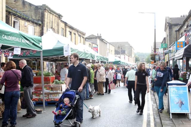 Crowds enjoy the selection at the Totally Locally street market, Commercial Street, Brighouse
