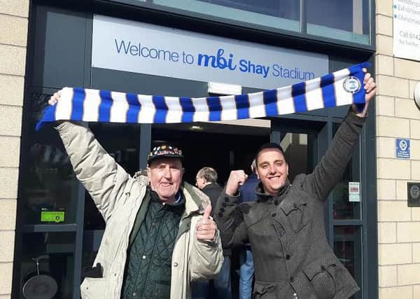 Halifax fans Brian Bentley and Jamie Schofield outside The Shay after buying their tickets for the FA Trophy final.
