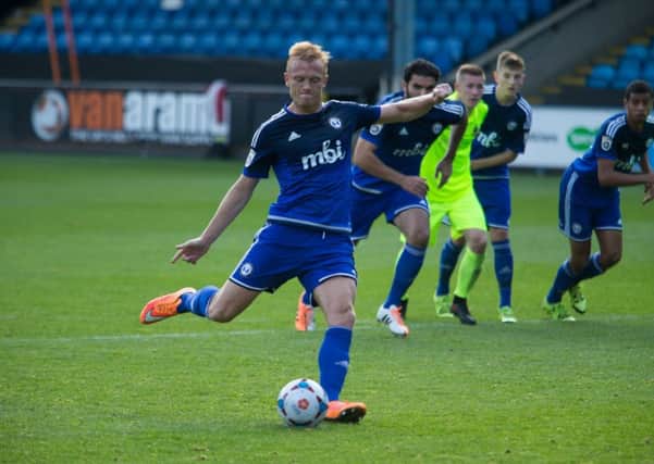 Jordan Burrow scored for Halifax in their 3-1 defeat at Boreham Wood on the opening day of the season