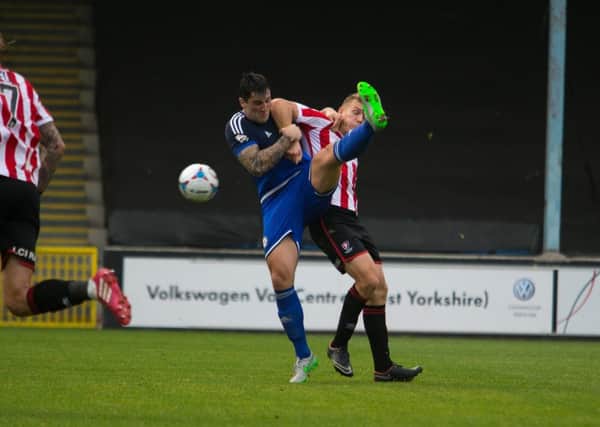 Actions from FC Halifax Town v Cheltenham at the Shay, Halifax. Matty Brown