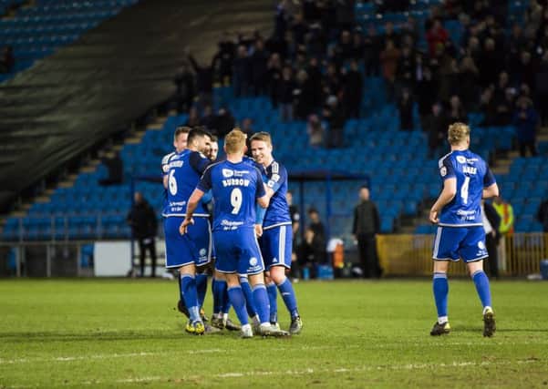 FC Halifax Town celebrate a goal in the 3-2 win over Boreham Wood at the Shay.