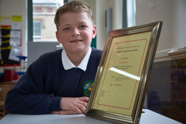 Sam Whiteley aged eleven, a pupil at Bowling Green School, Stainland, winner of the Percival Whitley Award.