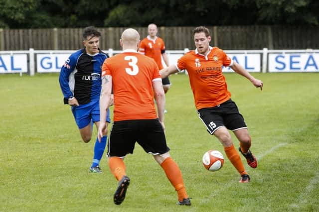 Brighouse Town v Ashton United. James Hurtley for Brighouse.