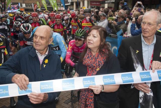 Brian Robinson, Joanne Roney and Cllr Peter Box share a joke as they perform the starting ceremony in Wakefield for the start of the Tour de Yorkshire
