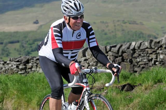 Barry Hoban climbs up Kidstones pass  part of  the first stage of the 2014 Tour de France.