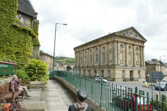 Incredible Edible  

Local views of Todmorden town centre
Old man sitting and Town hall