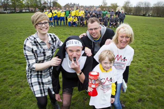Charity football match between Old Pond and Old Pond Ledgends for Cardiomyopathy UK in memory of Lisa Freeman. From the left, landlady Helen Crawshaw, referee Nigel Hunt, organiser Andrew Dawson, Lucas Dawson, seven and Denise Dawson.