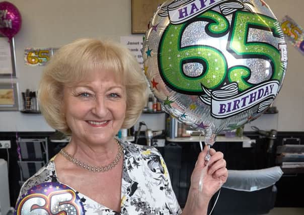 Janet Tuck celebrates her 65th birthday and 25 years at Sissors Hairdressers, Lighcliffe.