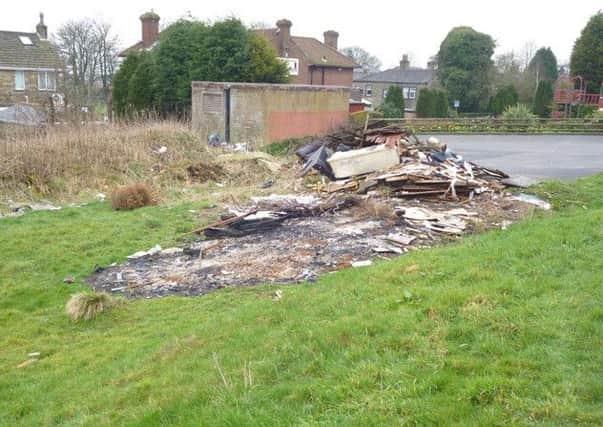Fly-tipping rubbish dumped on spare land behind Shoulder of Mutton pub
