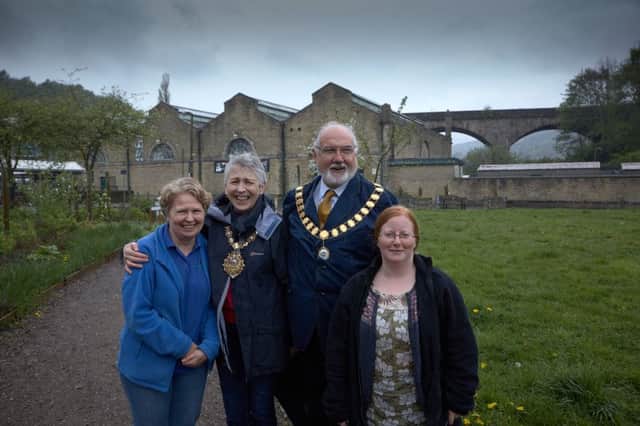 The Mayor of Todmorden Coun Steph Booth and the Mayor elect Coun Tony Greenwood with Roweena Hudson and Joevanka Gregory promote the Todmorden Festival at Pollination Street.