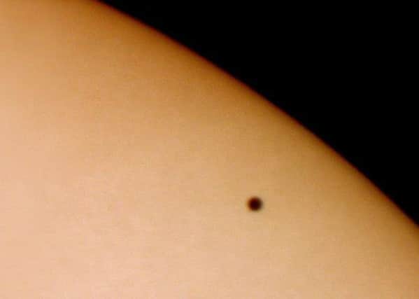 UNSPECIFIED - JANUARY 30:  This image of a tiny Planet Mercury transiting across the face of the Sun was taken on 7 May 2003 using a digital camera attached to an ETX90 telescope. Photograph by Jamie Cooper.  (Photo by SSPL/Getty Images)