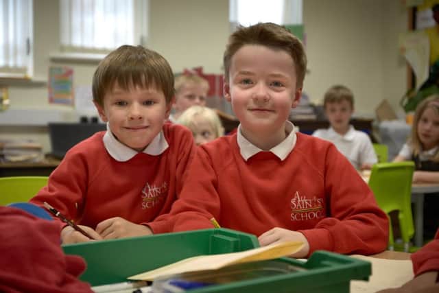 All Saints' CE School has been nationally recognised for its exceptional 2015 performance. Adam Barber aged six and William Hargreaves aged seven