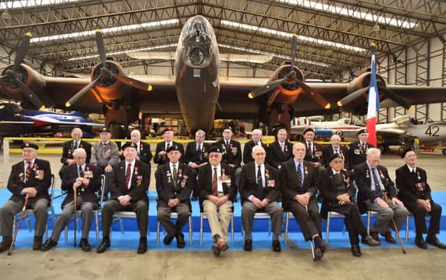 Legion d'Honneur medals presented to 21 Normandy Veterans at Yorkshire Air Museum on Sunday 22nd May, 2016. Pictured front from left are, Albert Edward Barritt, Norman Berryman, Kenneth Charlton, Kenneth Cooke, Douglas Dawson, Reginald Deighton, George Grahm, Dennis James Haydock and James Joseph Healy, with back from left, Horace Hodgson, George Hubert Hollings, Kenneth Alfred Johnson, James Matthew Johnston, Robert Mathieson, Ernest Naylor, Harry Ramsey, Bernard John Richardson, Willie Riley and Kenneth William Smith, all who recieved the medal from Colonel Bruno Cunat, French Liasion Officer to the Ministry of Defence. Picture David Harrison/ Yorkshire Air Museum.