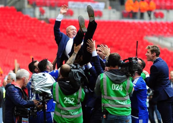 The FA Trophy Final.
FC Halifax v Grimsby Town.
Halifax player celebrate with manager Jim Harvey..
22nd May 2016.
Picture : Jonathan Gawthorpe