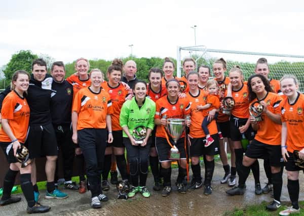 Brighouse celebrate winning the league