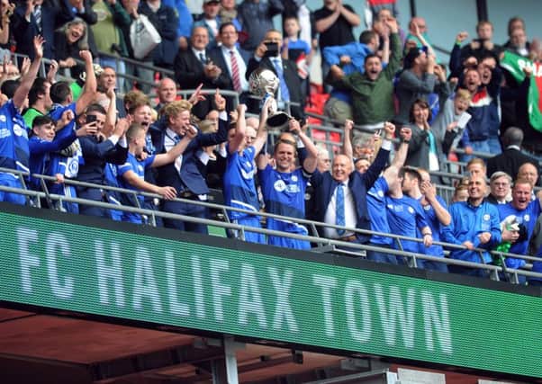 The FA Trophy Final.
FC Halifax v Grimsby Town.
Halifax players celebrate.
22nd May 2016.
Picture : Jonathan Gawthorpe