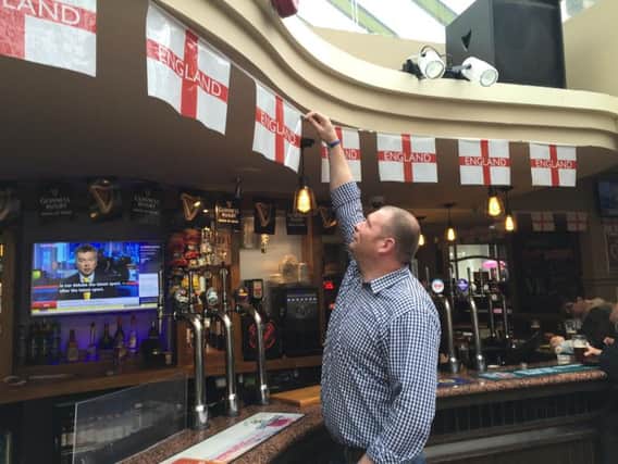 Pubs getting ready for the Euros in Halifax. The Cat and Fiddle pictured with bar landlord Dave Frederiksen.