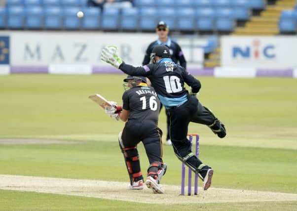 Ben Cox tries to take a catch to dismiss Yorkshire's Tim Bresnan.