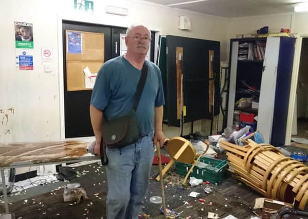 Douge Robertshaw pictured at Boothtown Centre, which was trashed by burglars.