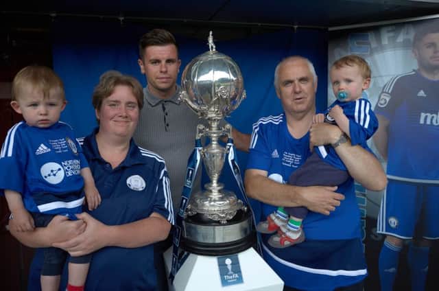 FC Halifax Town civic reception for fans at the Shay. Scott McManus with Andy and Kelly Gilchrist and their twins Thomas and Jack.
