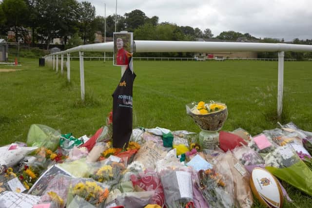 Floral tributes for young rugby player Ronan Costello at Brighouse Rangers Club.
