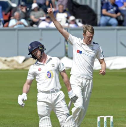 Steve Patterson celebrates taking Paul Collingwood's wicket in the County Championship at Durham earlier this week.  Picture: Bruce Rollinson