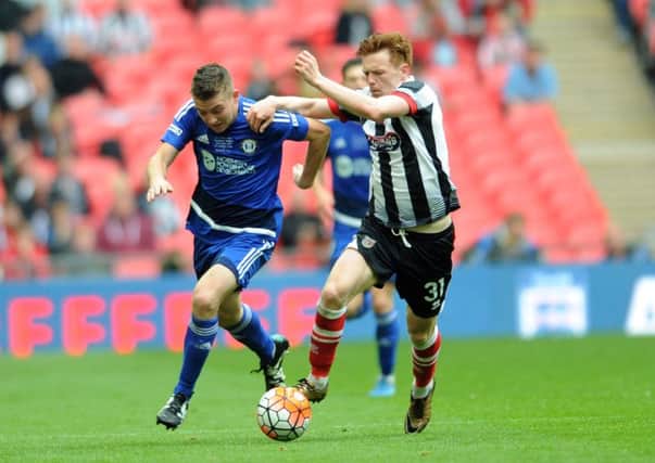 The FA Trophy Final.
FC Halifax v Grimsby Town.
Halifax's Jake Hibbs takes on Grimsby's Jon Nolan.
22nd May 2016.
Picture : Jonathan Gawthorpe