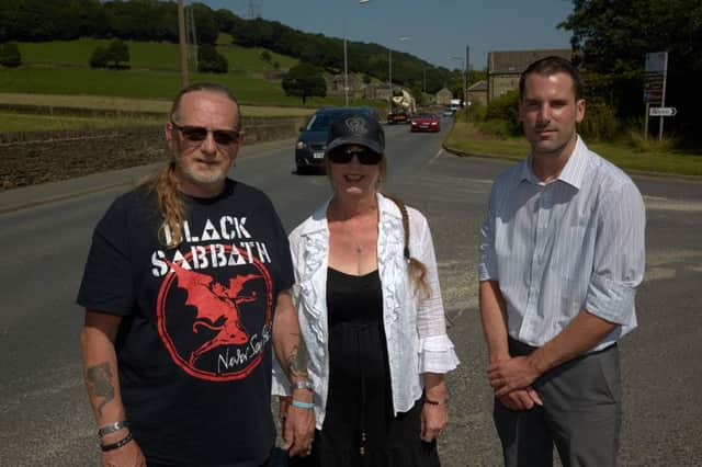 Philip and Anne Shaw with Coun Scott Benton at Elland Road, Brighouse.
