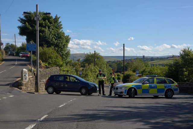 Police at the scene of the fatal crash