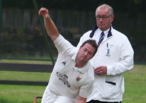 Nigel Horsfall bowling for Booth, in the Copley v Booth Parish Cup Cricket match at Copley