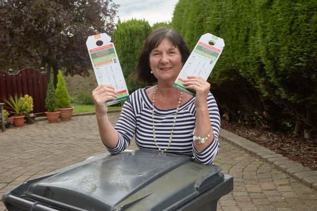 Debbie Powell with her two bin and recycling collection day.