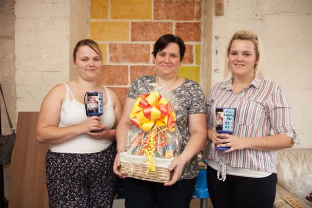 Fundraiser at Todmorden Climbing Skool in memory of Maia Rose Elizabeth Swales-Dawson.  Family fundraisers L to R Sofie Netherwood, Sarah Hill and Hannah Netherwood (photo: Kieron Nevison)
